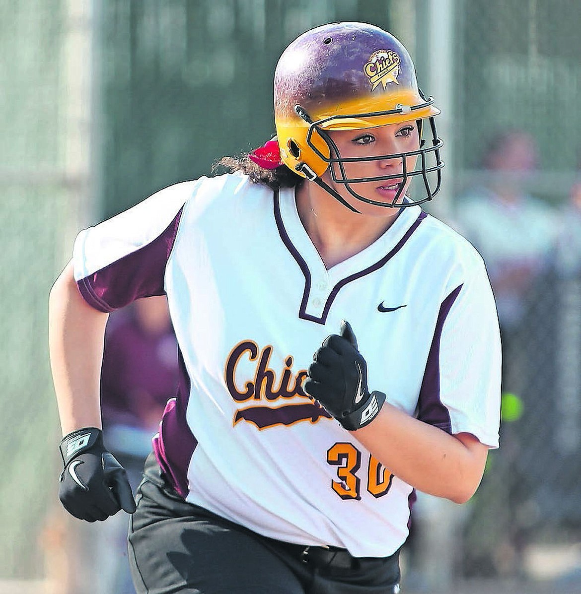 Moses Lake's Nikea Holman runs to first base during Game 1 Friday against Eisenhower at Larson Field.