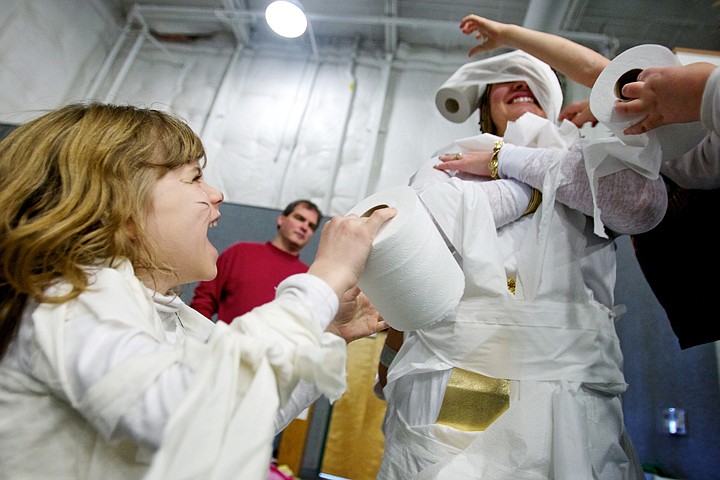 &lt;p&gt;JEROME A. POLLOS/Press Katie Dion, 7, takes a moment to enjoy her handiwork at wrapping Connie Johnson in toilet paper during a mummy making competition Friday during &quot;Egyptian Day&quot; at Classical Christian Academy in Post Falls.&lt;/p&gt;