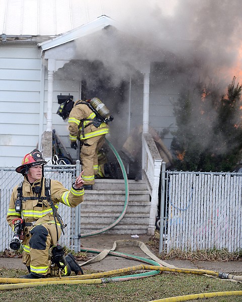 &lt;p&gt;&#160;Adam Smart of the Kalispell Fire Department works to put out the fire. &#147;Initially we went offensive, then the house was reported empty,&#148; Kalispell Fire Chief Dave Dedman said. &#147;At that point we pulled back and went defensive.&#148;&lt;/p&gt;&lt;p&gt;&lt;/p&gt;