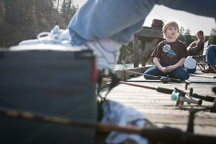 &lt;p&gt;JULIA MOORE/Press Evann Davis, 8, fishes Saturday afternoon at Fernan Lake. Idaho Fish and Game is currently looking into changing fishing rules for the 2011-12 season.&lt;/p&gt;