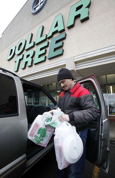 &lt;p&gt;In this March 16 photo, Larry Buckley leaves a Dollar Tree store in Batavia, N.Y.&lt;/p&gt;