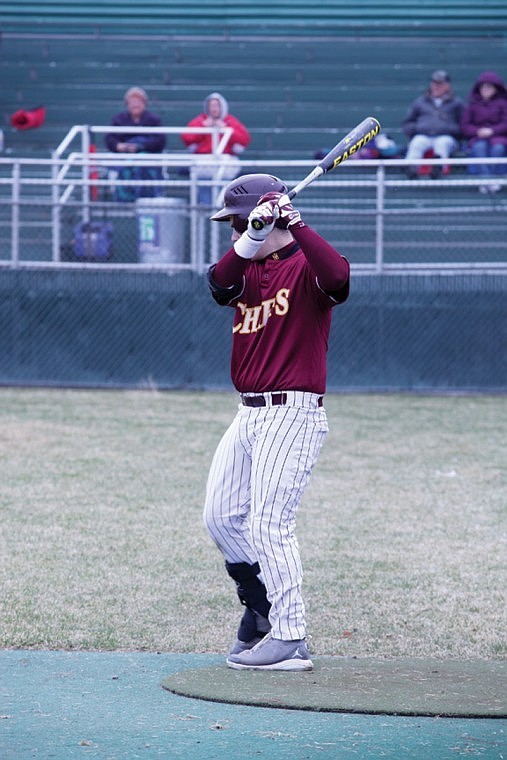 Jordan Hooper warms up in the on deck circle in the bottom of the second inning.