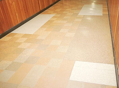 &lt;p&gt;Mismatched tile in hallway of middle/high school. Unable to purchase tiles to match the dimensions of the old.&lt;/p&gt;
