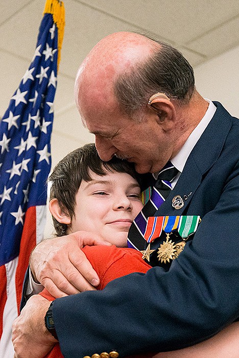 &lt;p&gt;Sgt. Leon Strigotte hugs his 14-year-old grandson Daniel Kahler, of Coeur d&#146;Alene, after being honored for his military service in Vietnam.&lt;/p&gt;