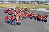 Peninsula students stand with Team Michael
