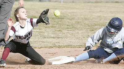 <p>Kaylee Tunison covering second base during first game of a doubleheader vs. Bonners Ferry Friday. Lady Trojans fall to Lady Badgers 0-18 and 2-12.</p>
