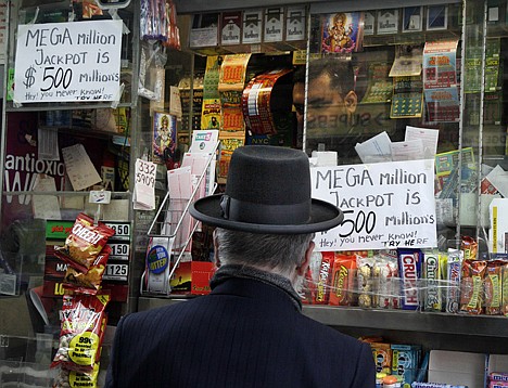 &lt;p&gt;A Mega Millions lottery contestant buys his ticket for Friday's $500-million game at a corner newsstand in New York, Thursday. Forget setting up a charity or establishing a trust, the winner of the $500 million Mega Millions jackpot could save teachers' jobs or help pay for Medicaid-funded doctor appointments in their home state just by paying taxes.&lt;/p&gt;