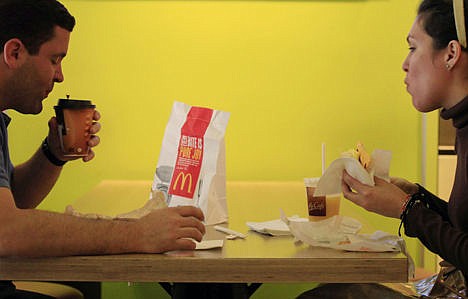 &lt;p&gt;Carlos Gonzalez and Elsa Guzman eat breakfast at a McDonald's restaurant in New York, Sept. 12, 2012.&lt;/p&gt;