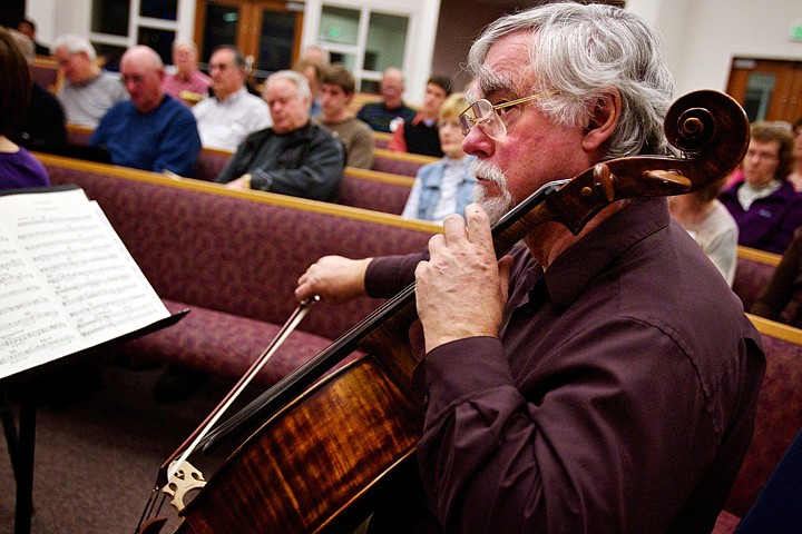 &lt;p&gt;William Conable keeps an eye on the conductor during a rehearsal Tuesday of the Northwest Sacred Music Chorale in Post Falls.&lt;/p&gt;