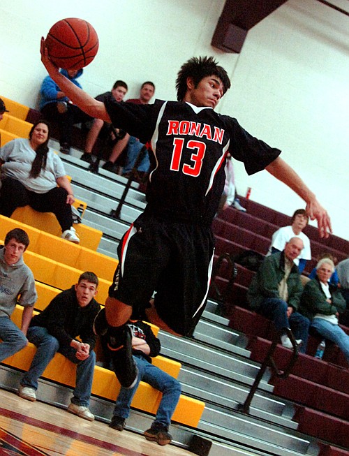 Ronan's Lucas Black saves the ball out of bounds.