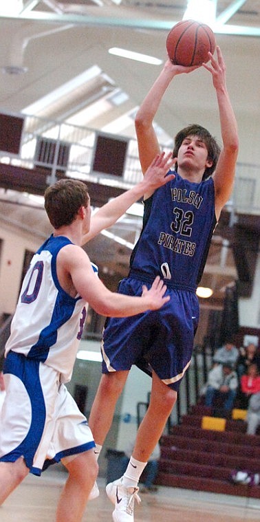 Polson's Louis Mohr takes a jump shot against a Bigfork defender.