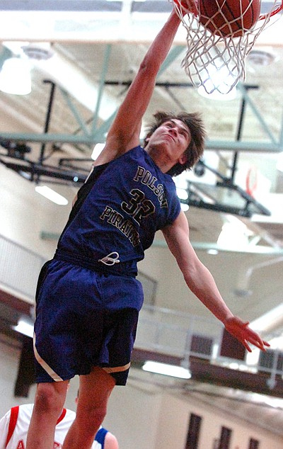 Polson's Louis Mohr slams down a dunk.