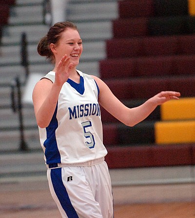 Kyla Mitchell smiles while being introduced before the all-star game.