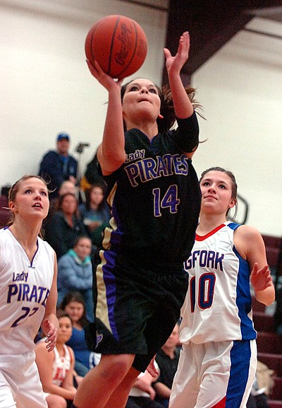 Polson's Mariah Hamel slices through the all-star defenders.