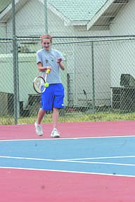 Cary Chamberlain gets back into the swing of things at practice last week. The girls are ready for a new season of tennis and hope to win state this year.