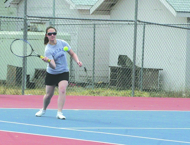 Michele Reinalt takes a look at the incoming ball and prepares to knock it back to her opponent during practice last week.