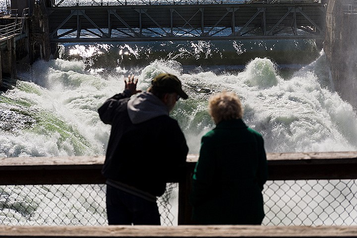 &lt;p&gt;SHAWN GUST/Press&lt;/p&gt;&lt;p&gt;Hayden residents Earl and Florence Stovall admire the Spokane River at full flow from a lookout area near the Post Falls dam.&lt;/p&gt;