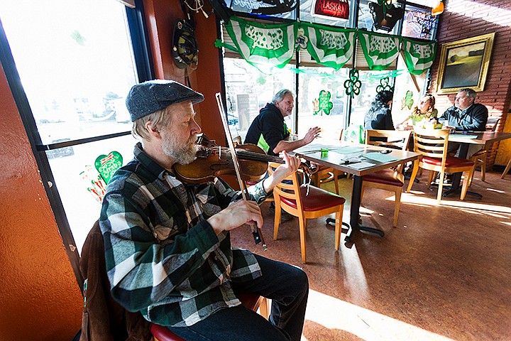 &lt;p&gt;SHAWN GUST/Press&lt;/p&gt;&lt;p&gt;Arvid Lundin provides patrons of Kelly&#146;s Irish Pub and Grill with Irish fiddle music Monday as part of St. Patrick&#146;s Day celebrations at the Coeur d&#146;Alene pub.&lt;/p&gt;