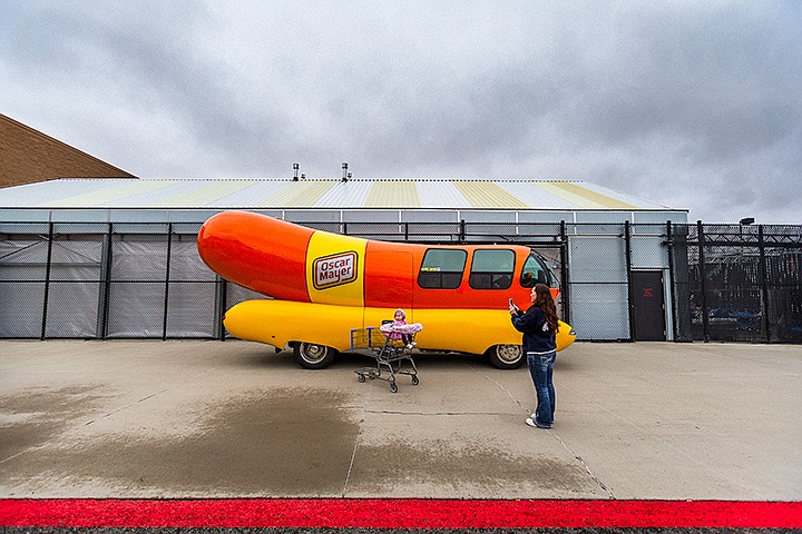 &lt;p&gt;SHAWN GUST/Press&lt;/p&gt;&lt;p&gt;Lynn Pampian, of Bayview, uses her cell phone to take a picture of her toddler daughter Helena Nimmo in front of the Oscar Meyer Wienermobile Friday in the Hayden Walmart Supercenter. The vehicle, one of six in a fleet of Wienermobiles, made the stop as part of its tour across American to promote the company and to recruit college graduates.&lt;/p&gt;