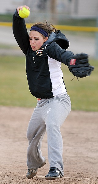 Shalaina Duford sends a pitch to her sister Kayla Duford during practice on Thursday afternoon in Polson.