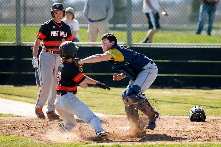 &lt;p&gt;The Post Falls Trojans square up against the Timberlake Timberwolves on Friday, April 1, 2016 at Post Falls High School. The Trojans emerged victorious. TO PURCHASE PHOTO: www.cdapress.com/photos&lt;/p&gt;