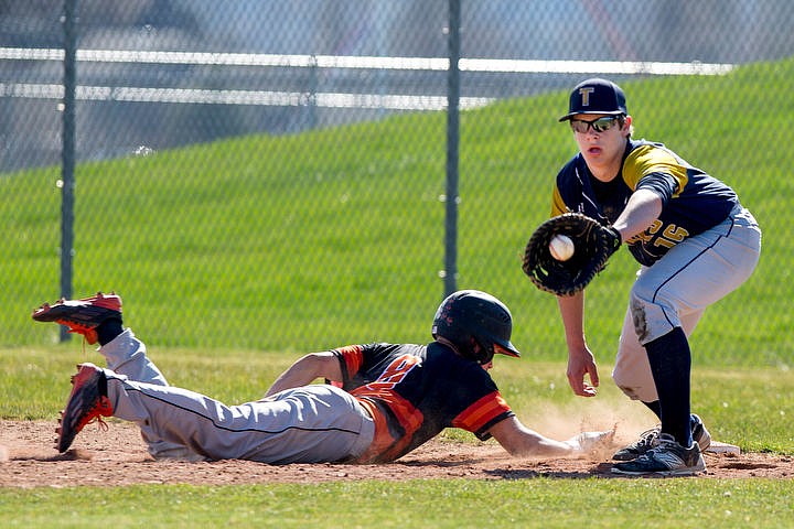 &lt;p&gt;The Post Falls Trojans square up against the Timberlake Timberwolves on Friday, April 1, 2016 at Post Falls High School. The Trojans emerged victorious. TO PURCHASE PHOTO: www.cdapress.com/photos&lt;/p&gt;