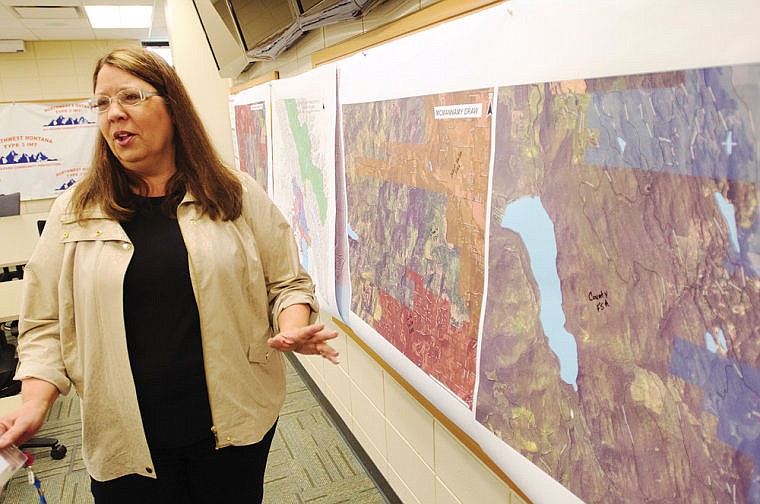 &lt;p&gt;Cindy Mullaney talks about fire prediction maps Friday morning at the Flathead County Dispatch and Emergency Operation Center.&lt;/p&gt;