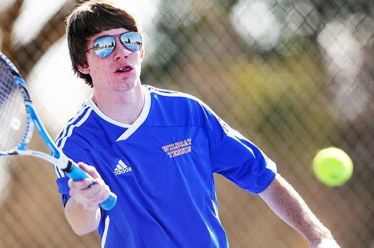 &lt;p&gt;Columbia Falls junior Casey Burghduff lines up for a hit Tuesday afternoon during Columbia Falls' match against Ronan. Tuesday, March 26, 2013 in Columbia Falls, Montana. (Patrick Cote/Daily Inter Lake)&lt;/p&gt;