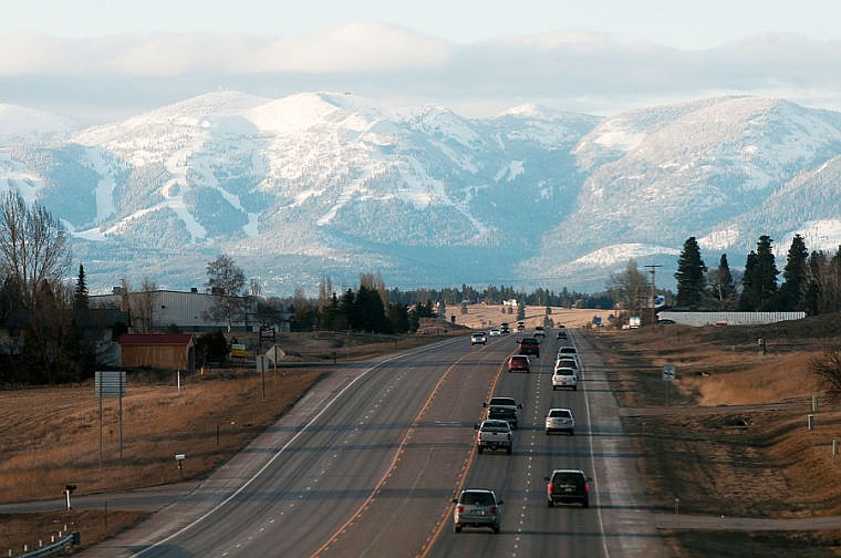 &lt;p&gt;Vehicles travel along U.S. 93 Friday night as the sun sets on Big Mountain. The snow keeps piling up at Whitefish Mountain Resort, with almost 2 feet of new snow in the past week and a current base of 135 inches of snow at the summit.&lt;/p&gt;