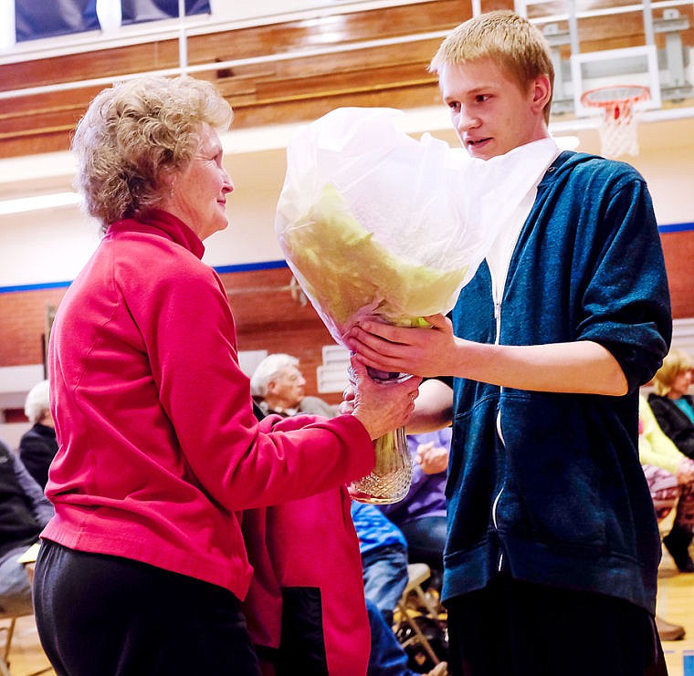 &lt;p&gt;Linderman student Riley Delaney gives Cheryl Fritz a bouquet of flowers Thursday afternoon at Linderman Education Center in Kalispell. March 27, 2014 in Kalispell, Montana. (Patrick Cote/Daily Inter Lake)&lt;/p&gt;