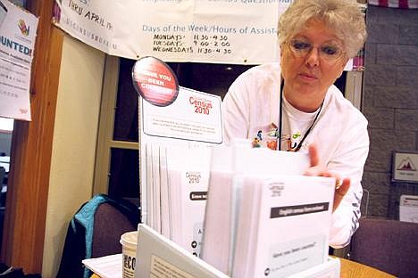 Sharon, a census worker who runs the questionnaire assistance center at the Idaho Department of Labor office, helps answer questions and provides additional census forms. She asked that her last name not be used due to census policy. (Photo by RALPH BARTHOLDT)