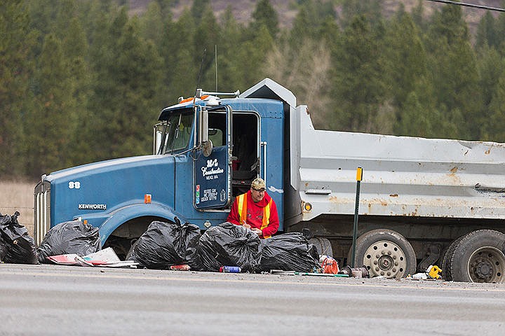 &lt;p&gt;Jeff Kimble, truck driver for M and L Construction, fills out a form near the scene of a two-vehicle accident near the intersection of Highway 53 and Pleasant View Road on Wednesday afternoon. Kimble drove into the ditch in an effort to avoid colliding with a vehicle that was stopped on Highway 53 waiting to turn. The semi struck the rear passenger side of the stationary vehicle causing moderate damage to both vehicles. No injuries were reported.&lt;/p&gt;