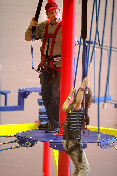 &lt;p&gt;Brian O&#146;Conner cheers on daughter, Cannie, 8, as she advances toward the next platform of the route.&lt;/p&gt;