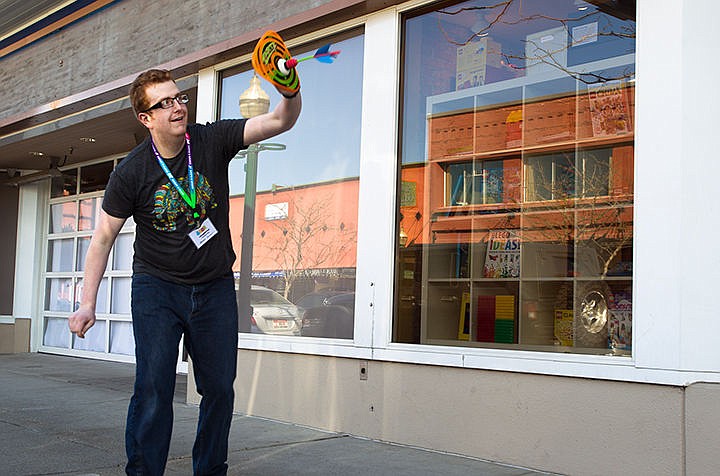 &lt;p&gt;Figpickles Toy Emporium employee Carlin Mitchell tests out a toy outside Figpickles in downtown Coeur D&#146;Alene on Friday. Mitchell says &#147;The only good way to know the product is to play with it.&#148;&lt;/p&gt;