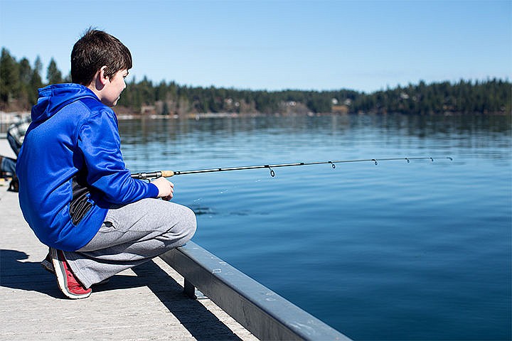 &lt;p&gt;Chase Gornick, 14, spends his Friday morning fishing at Honeysuckle Beach in Hayden Lake.&lt;/p&gt;