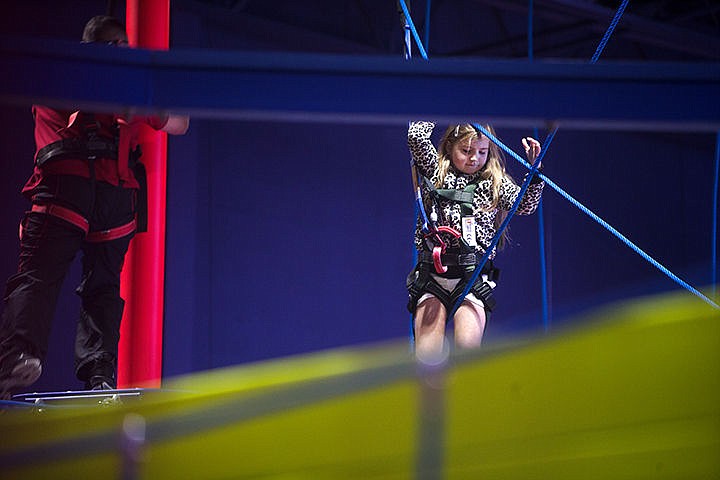 &lt;p&gt;Brynlee Frost, 9, makes her way through the ropes course Monday at Triple Play in Hayden. The ropes course is one of the newest attractions and opened on Friday.&lt;/p&gt;