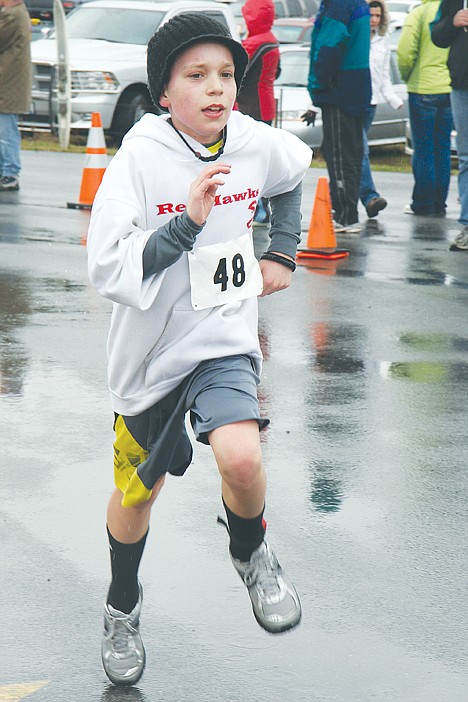 &lt;p&gt;Joseph Brueher, 12, of Hauser, sprints to the finish line of the Hauser 10K Ice Breaker fun run at Hauser Lake on Sunday.&lt;/p&gt;