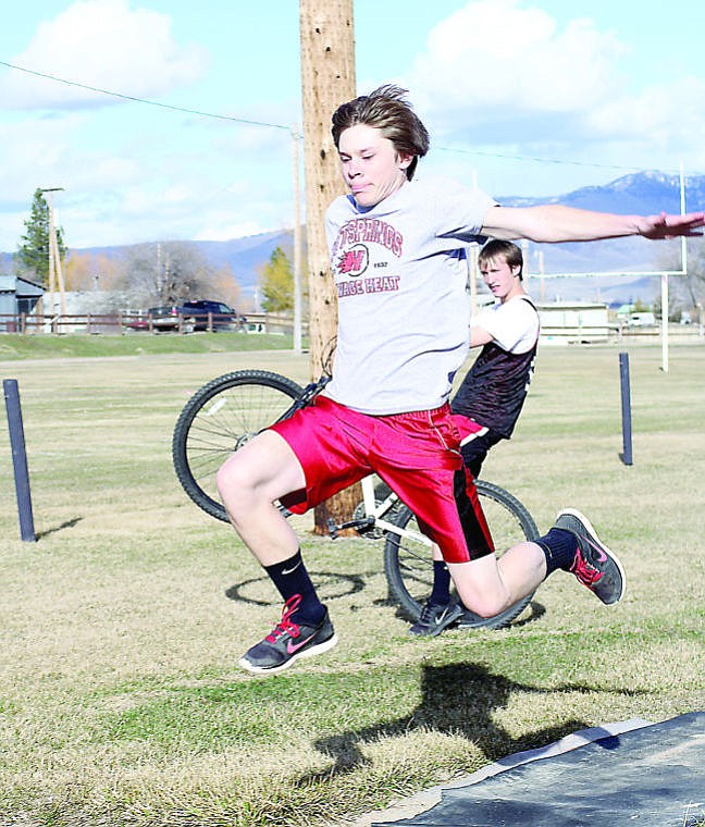 &lt;p&gt;Savage Heat senior Jarod White practices the triple jump event for the first track meet of the season.&#160;&lt;/p&gt;