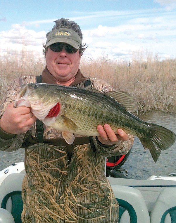 Dick Hampton shows a fine late March Largemouth that he fooled with a Flippin' Jig. Dick released the 6-pound, 10-ounce pig.