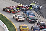 Newman survives wild finish; Power surges to IndyCar win