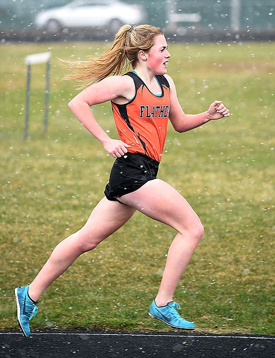 <p>Flathead junior Gillian Maness running in the girls 1600 on Thursday, April 2, in Kalispell. Schutt ran the event with a time of 5:19.95. (Brenda Ahearn/Daily Inter Lake)</p>