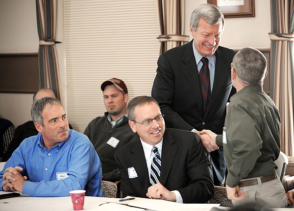 Senator Max Baucus shakes hands with Columbia Falls businessman Dave Renfrow as he makes his way around the room at the Chamber of Commerce in Kalispell on Tuesday afternoon. Baucus addressed the crowd on the way new health care legislation will affect Montana businesses.
Senator Max Baucus addresses the crowd at the Chamber of Commerce on the effect of new health care legislation on Montana businesses on Tuesday in Kalispell.