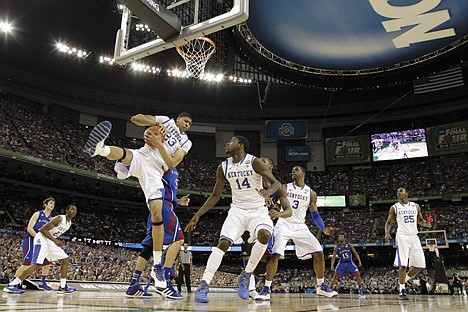 &lt;p&gt;Kentucky's Anthony Davis (23) grabs a rebound during the first half of the NCAA Final Four tournament college basketball championship game against Kansas Monday, April 2, 2012, in New Orleans. (AP Photo/David J. Phillip)&lt;/p&gt;