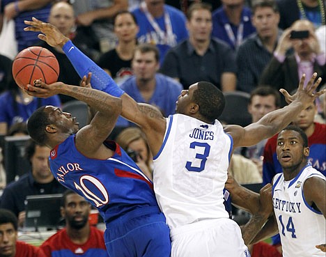 &lt;p&gt;Kentucky's Terrence Jones (3) tries to block a shot by Kansas' Tyshawn Taylor during the second half of the NCAA Final Four tournament college basketball championship game Monday, April 2, 2012, in New Orleans. (AP Photo/Bill Haber)&lt;/p&gt;