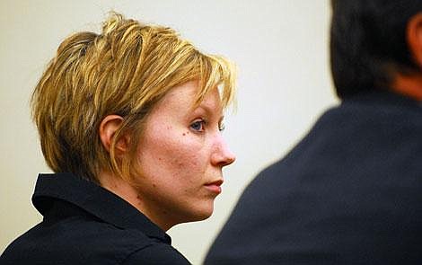 Steffanie Ann Schauf listens to the verdict Wednesday in Flathead County District Court. Schauf was found guilty of negligent homicide in the traffic-crash death of Brett Adams, 24, on July 1, 2006. Her sentencing is scheduled May 29. She remains free on bond. Garrett Cheen/Daily Inter Lake