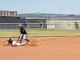 Knights, Cougars split doubleheader
