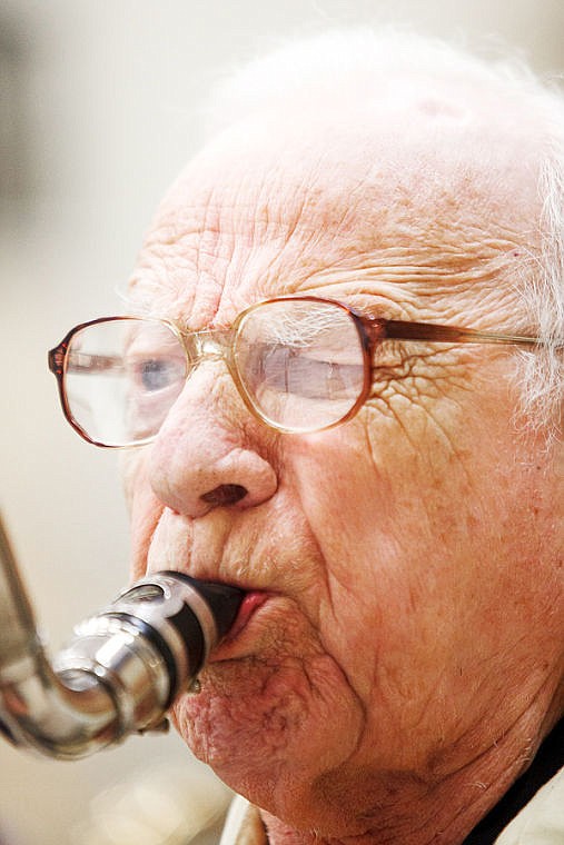 <p>John Hamel, shown here bass clarinet, is the bands oldest member at 90. He is also one of the groups most experienced musicians: He has played with the Detroit Concert Band and Benny Goodman.</p>