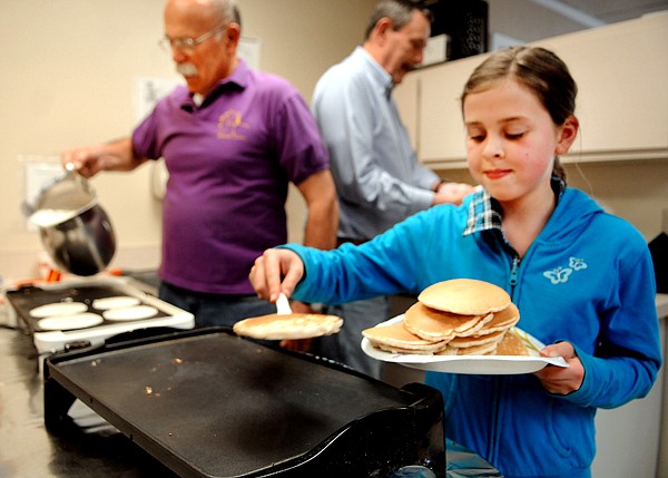 &lt;p&gt;Sarah Illi, 10, of Kalispell, helps her grandfather, Warren Illi of Kalispell, left, make pancakes on Thursday afternoon, March 29, at the Sunriser Lion 38th Annual Pancake Supper in the Saint Matthew's cafeteria in Kalispell. This was her second year volunteering with the supper, her grandfather has been helping with the event for the past 30 years. Also in the background is Foster Swan of Kalispell, center.&lt;/p&gt;