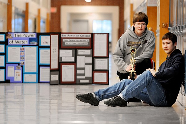 &lt;p&gt;From left, Colin and Colter Norick sit with one of their trophies and their science fair projects Wednesday, March 28, at Columbia Falls High School. The brothers, in seventh and ninth grades, respectively, each took home gold ribbons from this year&#146;s State Science Fair.&lt;/p&gt;