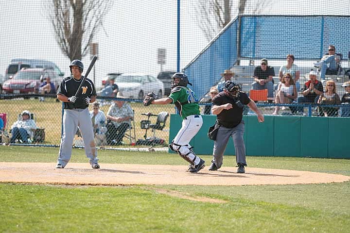 Home plate umpire punches out Walla Walla's Jarod Gonzales on a called third strick pitch from the Vikings Cody Johns in the top of the ninth inning of game one of the twin bill against the Warriors.